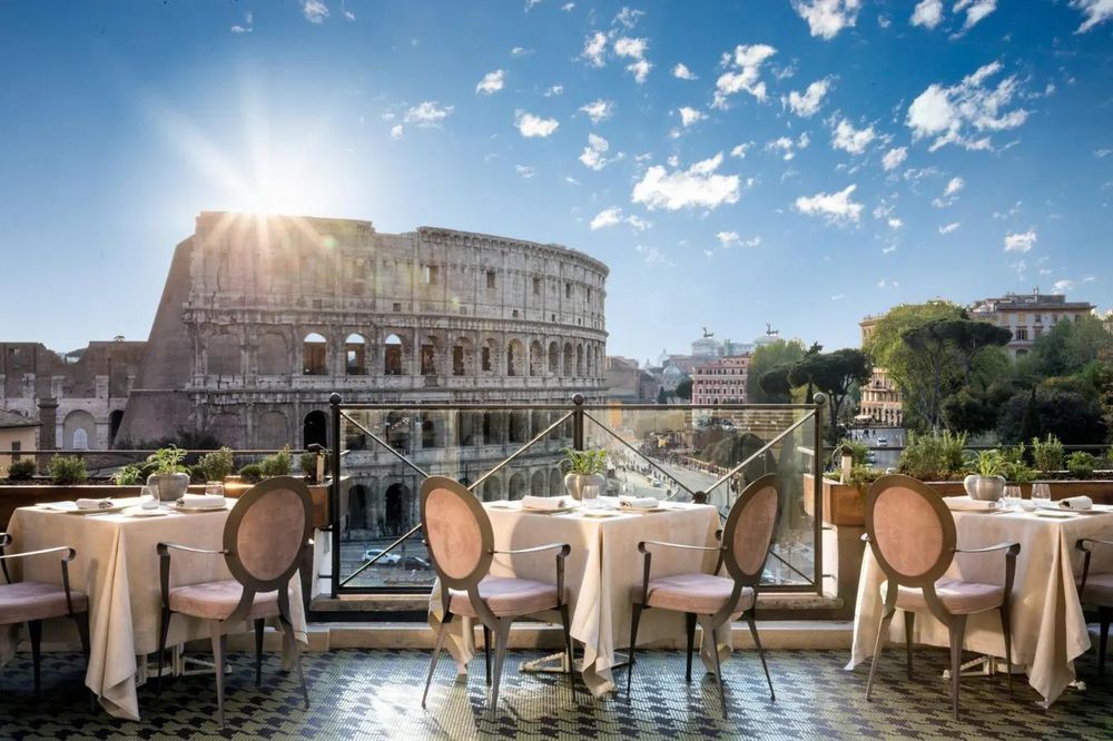 Elegant dining terrace with a view of ancient Rome